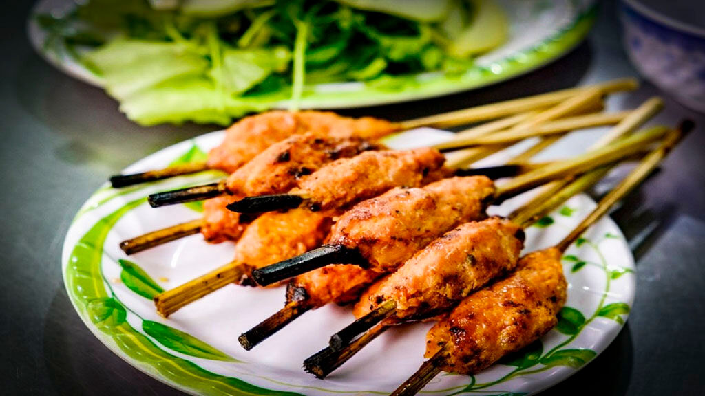 Savor smoky flavors with friends on a Hue food tour